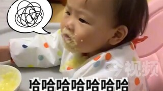 Baby drinking porridge—dad asks him to hold it higher, and the next second totally shocks dad