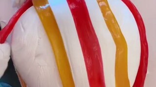 Watching a candy store handcraft candies... I really want to try that final "candy-shaking" step!
