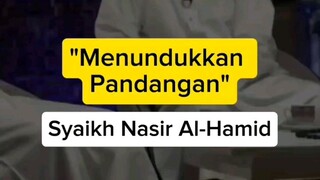 menundukkan pandangan