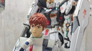What? A mobile suit with a figurine?