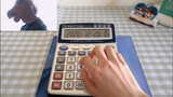 [The Fighter]  Mou Huanjun cover The Fighter dengan kalkulator.