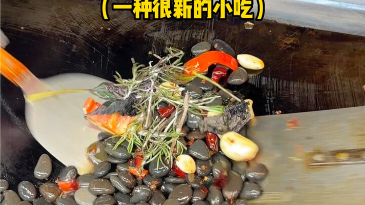 Can you believe it? I ate fried stones at the night market.