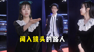Người qua đường đột nhập trần camera: Cô gái đang quay video bên lề đường, Tiêu Chiến đi vòng qua gó