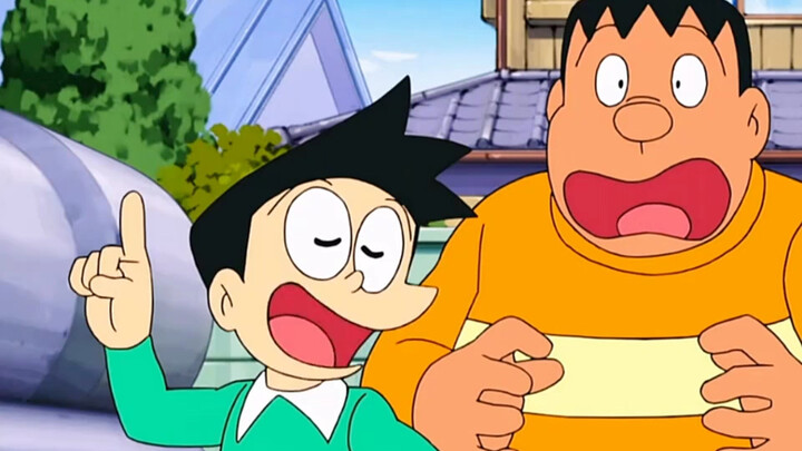 The blue fat man put the triple time sticker on Nobita's hand