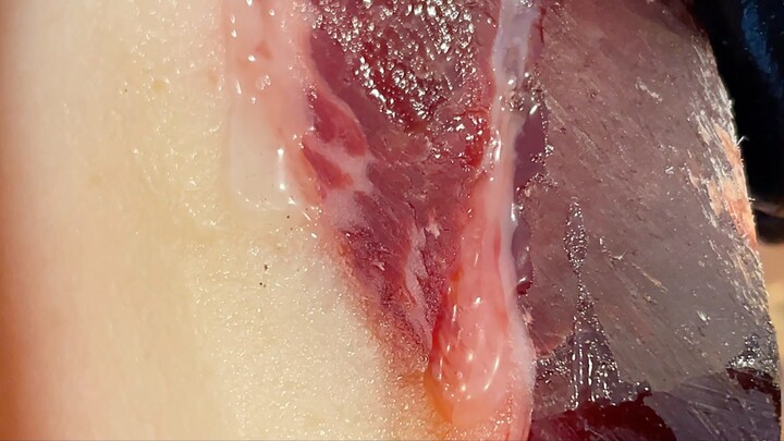 The rustling whispers, the stunning legs catch your eye—immersive ham-carving temptation.