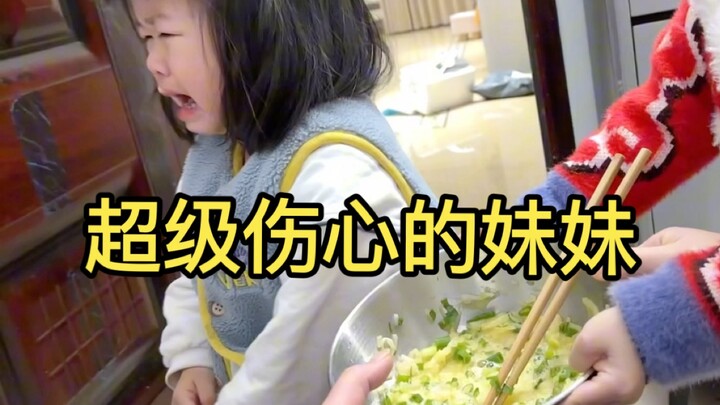 Because the brother had kindergarten homework and the sister didn't, she cried so hard.