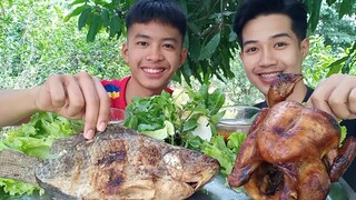 ไก่ย่างทั้งตัวและปลาเผา พร้อมผักและซีฟู้ด แซ่บๆด้วยกันนะครับ