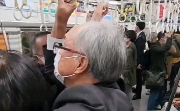 Japan’s Keikyu Line: Two men have a quiet fight—so polite! 😂