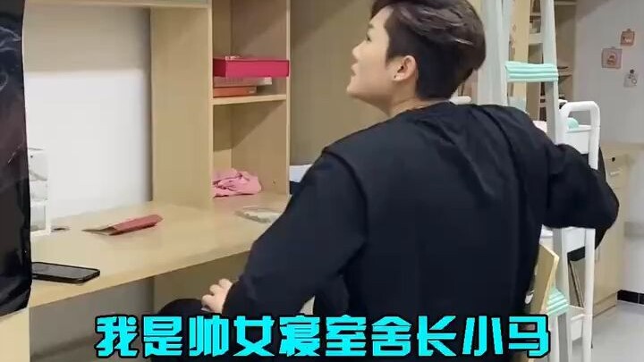 The senior female student checking the dorm seems really, really satisfied with our room...