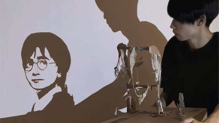 An artist has woven the light and shadow of paper scraps into Harry Potter.