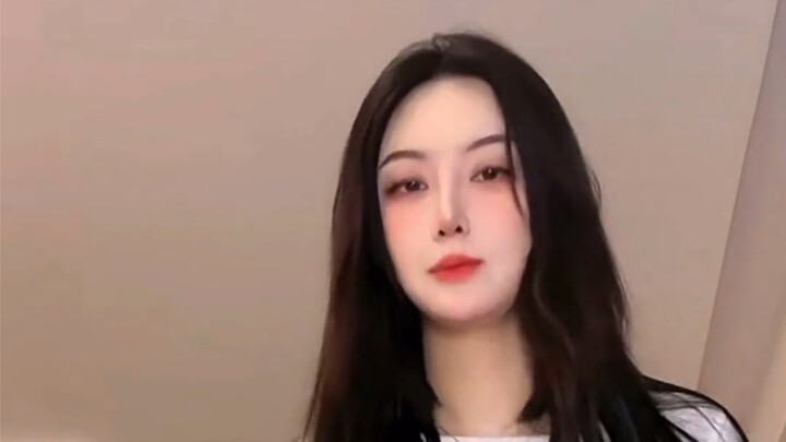 Sister Ding swings a sledgehammer