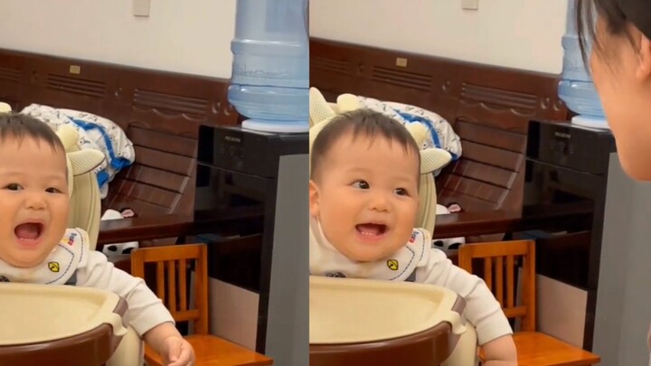 When the mother was playing with her baby, the baby called out "Mom" for the first time. The family 