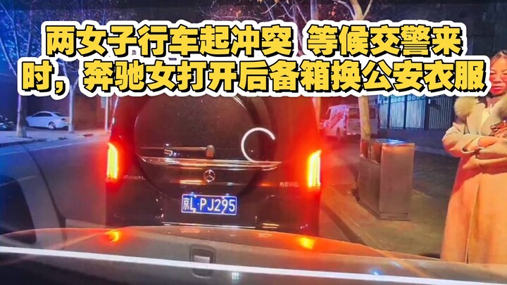 Two women clash while driving. As they wait for the traffic police to arrive, the Mercedes driver op