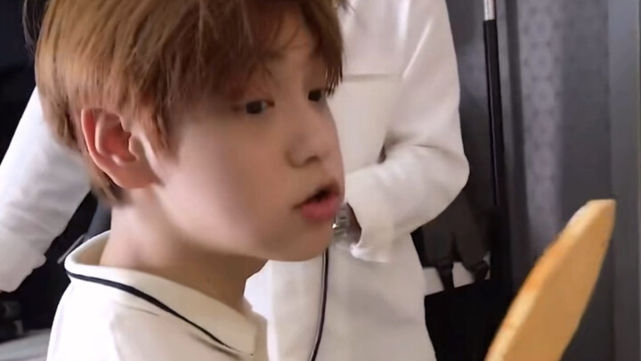 Such a cute, chubby brown-haired kid—I could eat five in one bite!