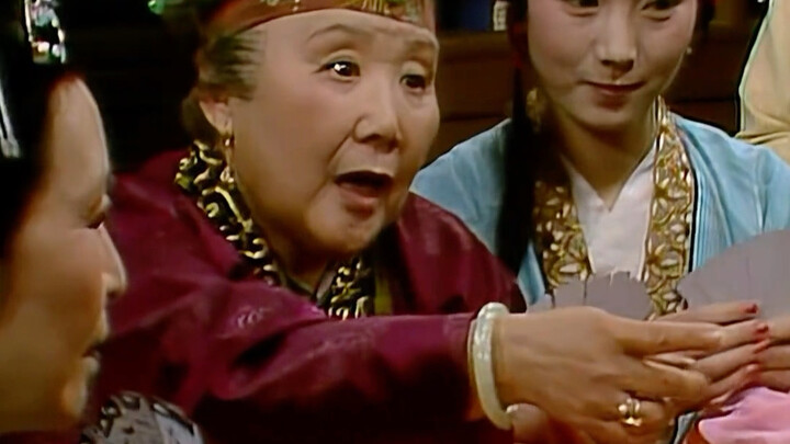 The social graces on Lady Feng’s table, a signature scene of Grandmother Jia winning the hand