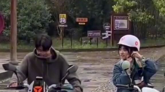 Shen Yue and Minghao ride a scooters together
