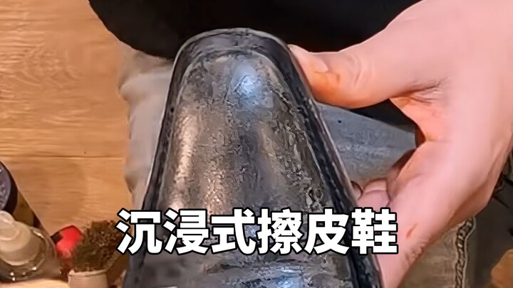 New York shoeshiner polishes old leather shoes to a brilliant shine