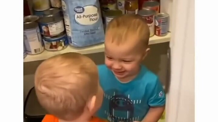 Just a second ago they were still crying, but as soon as the door opened, they instantly smiled and 