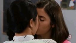 Lesbian kissing seen