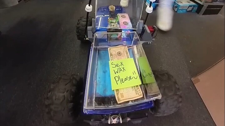 Good news for social phobics! Using a remote-controlled car to order stuff—check out the shop assist
