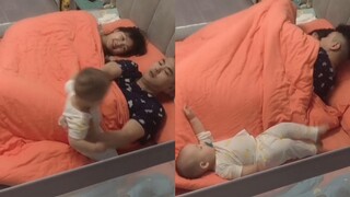 宝宝挨着妈妈睡被爸爸扔一边，随后反应逗乐网友：就差开口骂人了