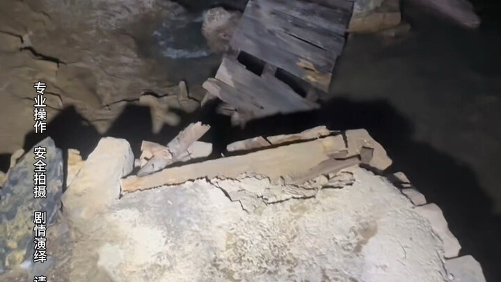 At the end of the broken bridge in the underground river, a message carved by those who came before 