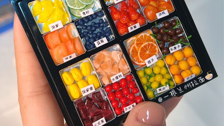 I set up a self-service licorice fruit stand inside an eyeshadow palette~