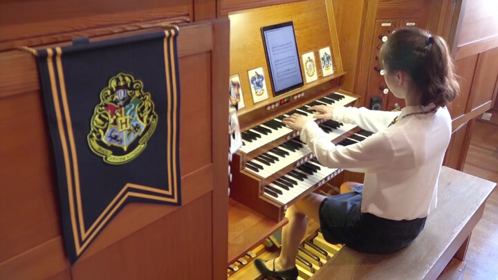 Playing Harry Potter's theme song on the organ