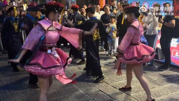 Xiangxi Corpse-Driving Dance Extravaganza — those costumes are a perfect match! The zombie lady? I’m