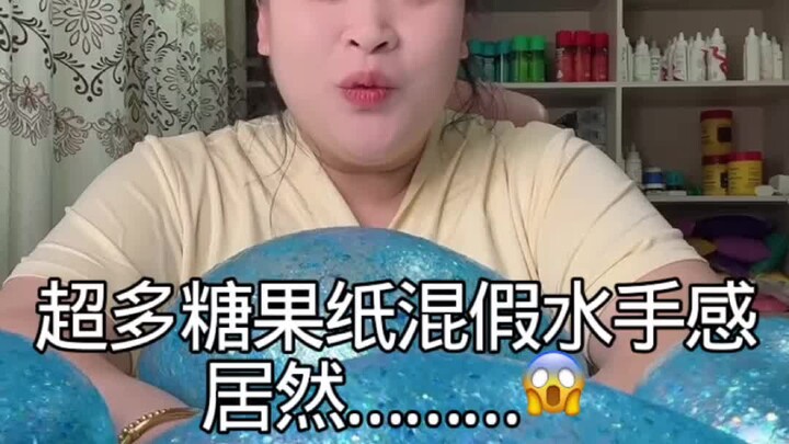 What kind of texture will you get when you mix tons of candy wrappers with fake water...?