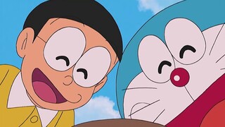 Đôrêmon: Nobita dùng máy truy tìm kho báu để săn tìm kho báu nhưng cậu không tìm được kho báu mà tìm