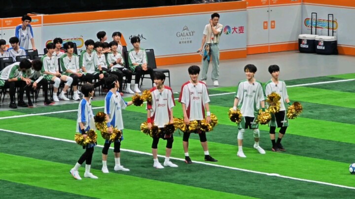 Football cheerleaders from the third and fourth generations perform "Waiting for Auntie's Answer"