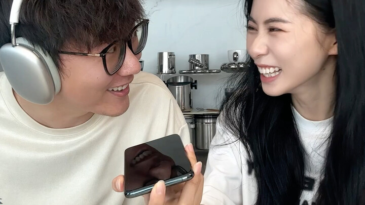 Making a call to a friend while wearing headphones