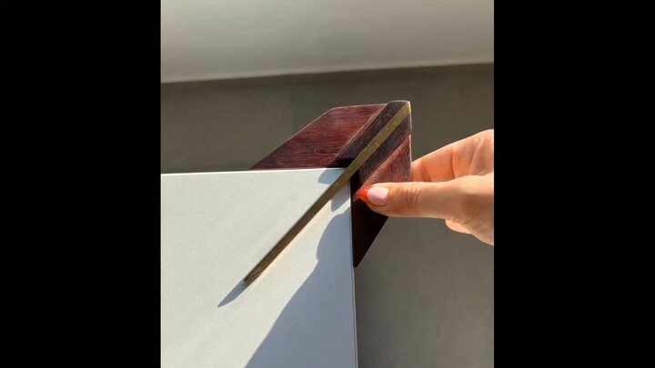 Amir Uzan - 13. Wooden centerpiece, made of purpleheart and brass.