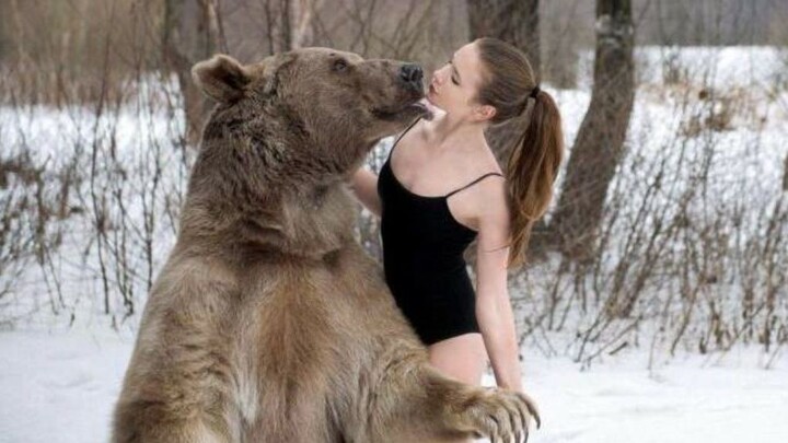 No wonder they’re Russians! They’re walking a bear again!