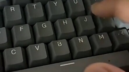 The young man at home just bought a new keyboard.