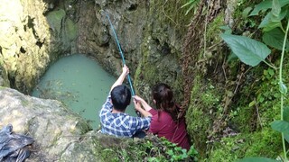 Two men catch a massive fish