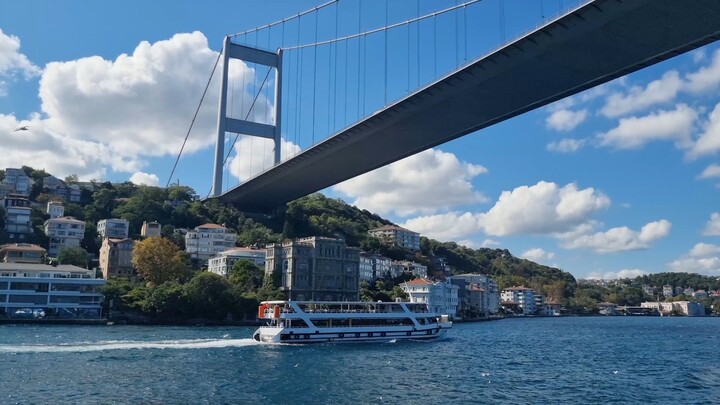 Sailing past Istanbul’s famous Bosphorus palaces beneath the bridge. ⛵🏛️🌉