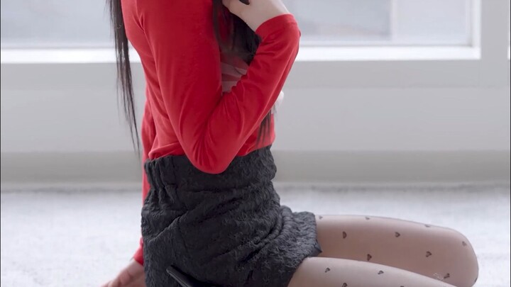 HeeSol’s chic outfit: a fiery red dress with black socks