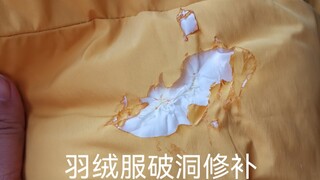 Jaket bulu angsa dengan lubang akibat terkena setrika, dihias dengan bordir dan diperbaiki