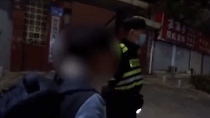 A 12-year-old boy wanders late at night with his schoolbag on his back. His simple words—“I just wan