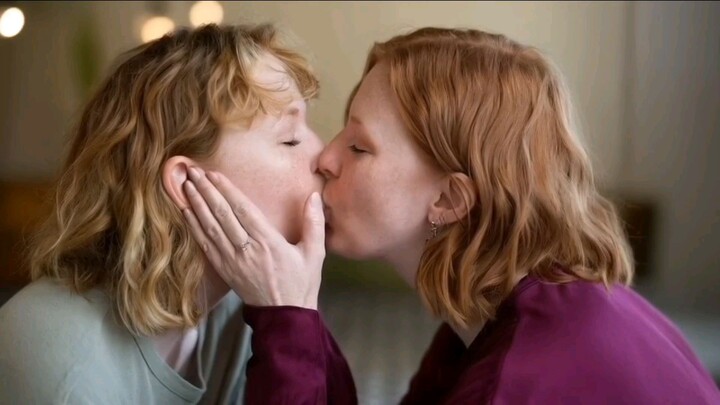 Lesbian kissing seen
