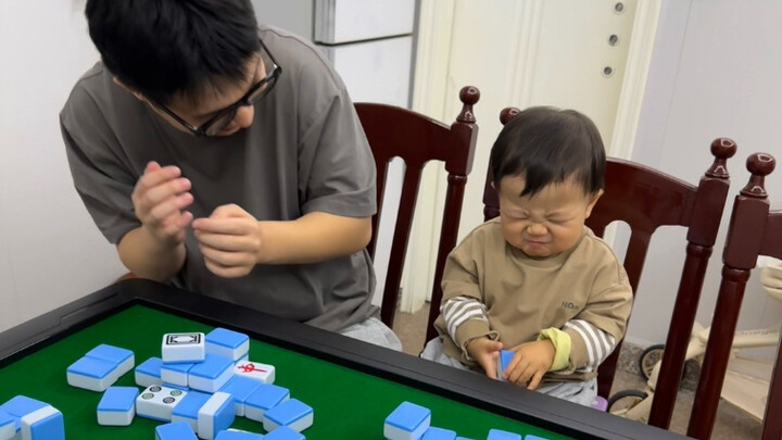 Little He, who's just over one year old, has started practicing card touching...