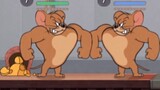 On the left and right are men [Tom and Jerry Sand Sculpture Collection #130]
