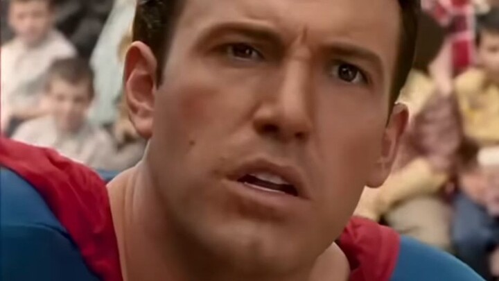 The kid pointed a gun at Superman...