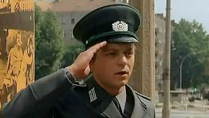 Satire: A lower-class worker buys the minister's used car, and traffic cops salute him on the road