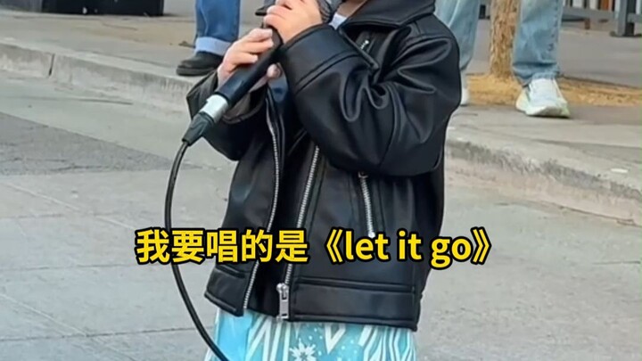A 2-year-old girl takes to the streets and sings “Let It Go”; anyone who comes across this video tod