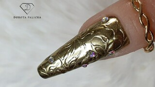 Embossed chrome nail art. Gold chrome nail design, coffin shape gel nails.