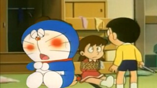 Doraemon: Nobita, listen to my explanation. Shizuka and I are just playing around! (Danger)