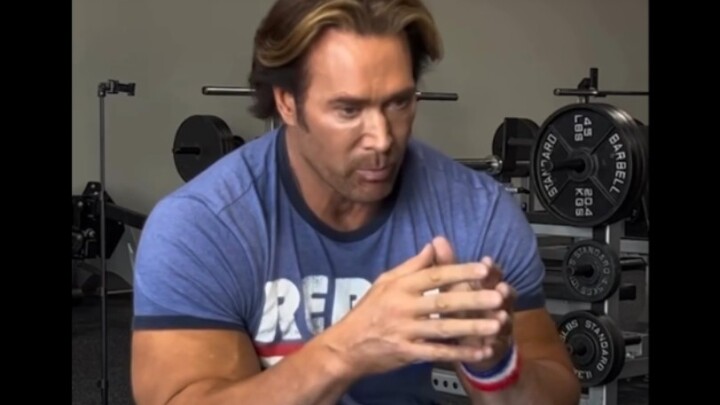 Middle-aged guy shows off his workout